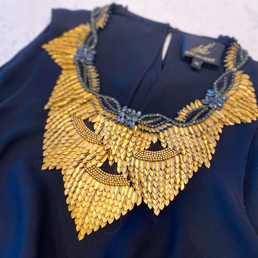 Designer top, cold shoulder blouse with neck detail. Only worn once!